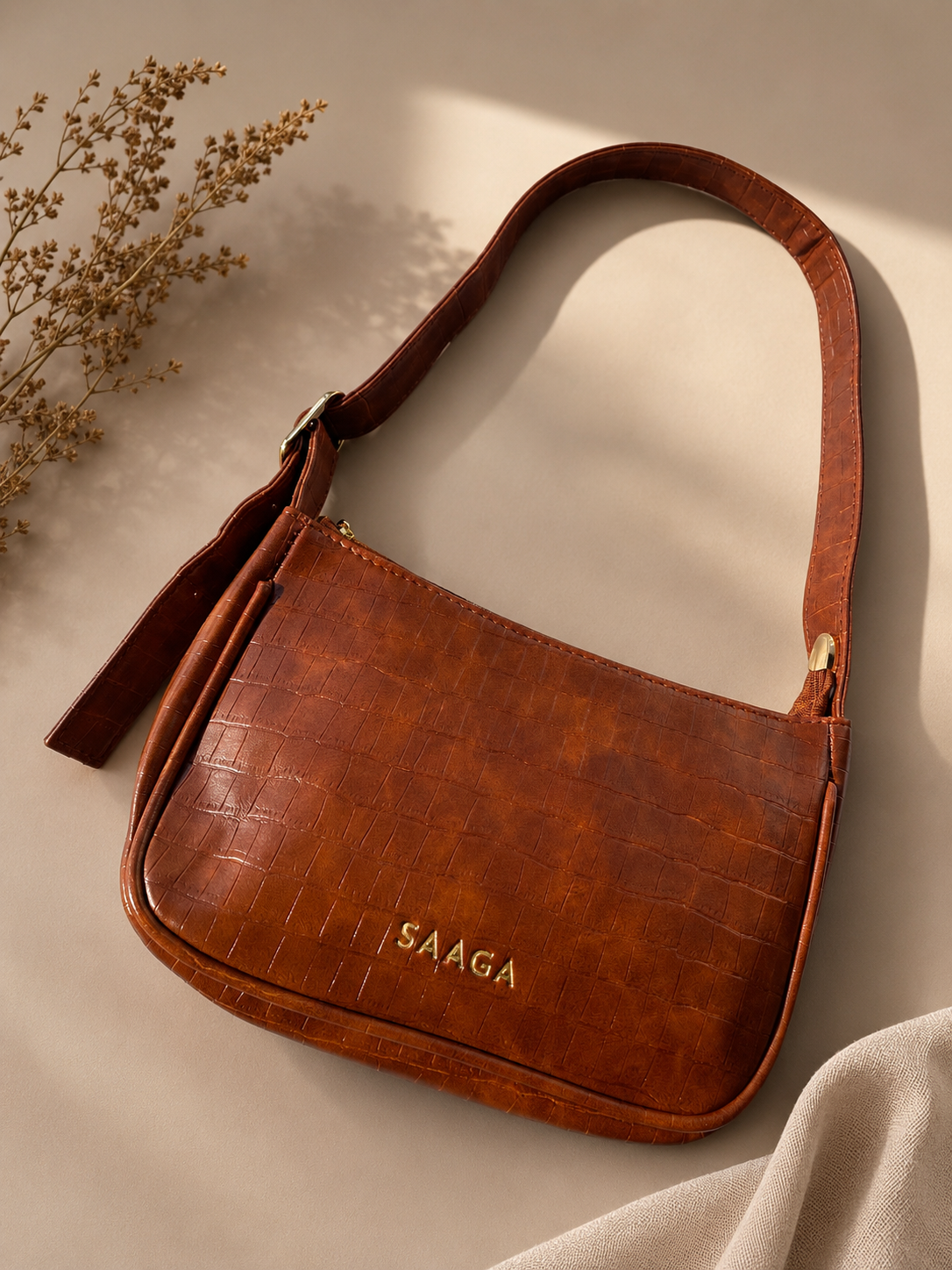 Tan metro sling